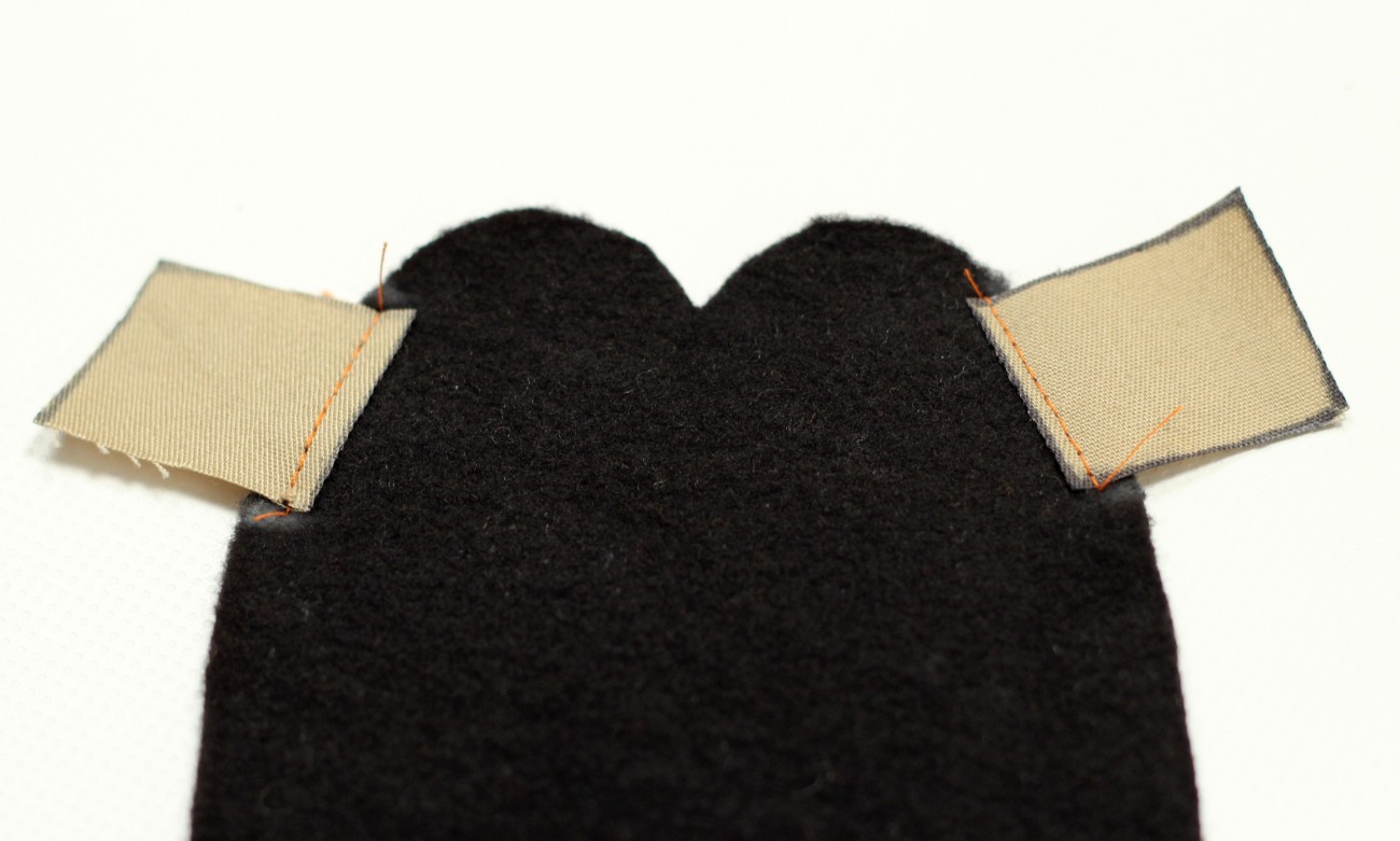 11 - stitch two rod pockets to arm piece